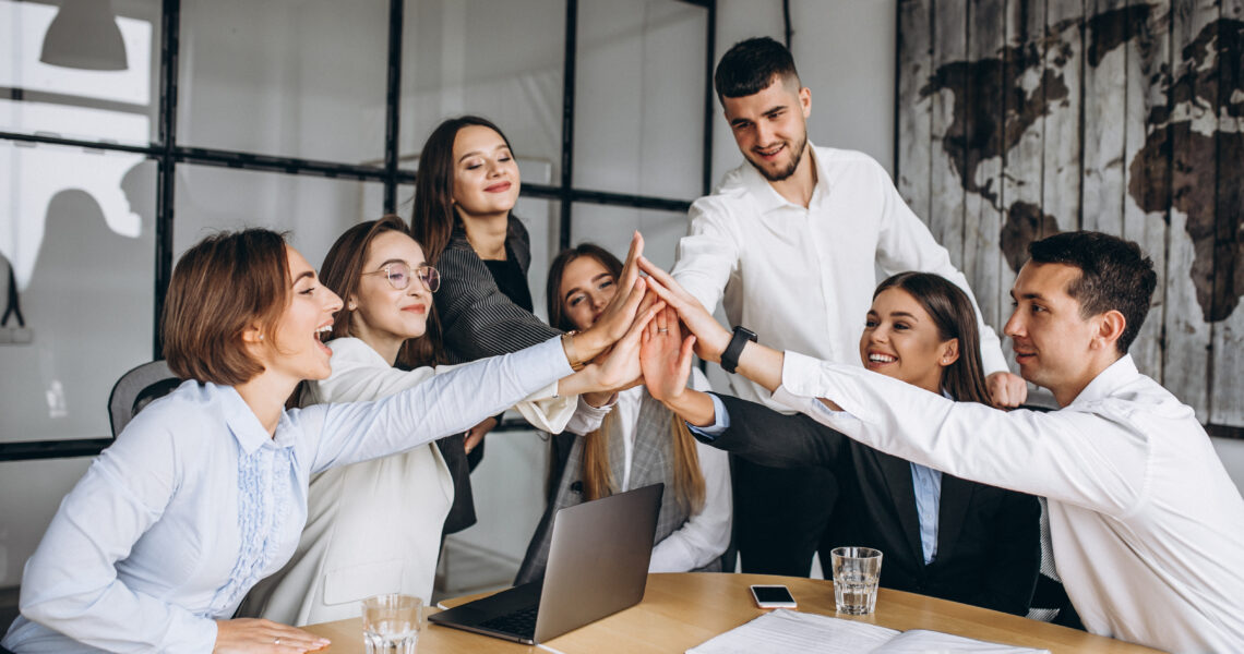 Group of people working out business plan in an office